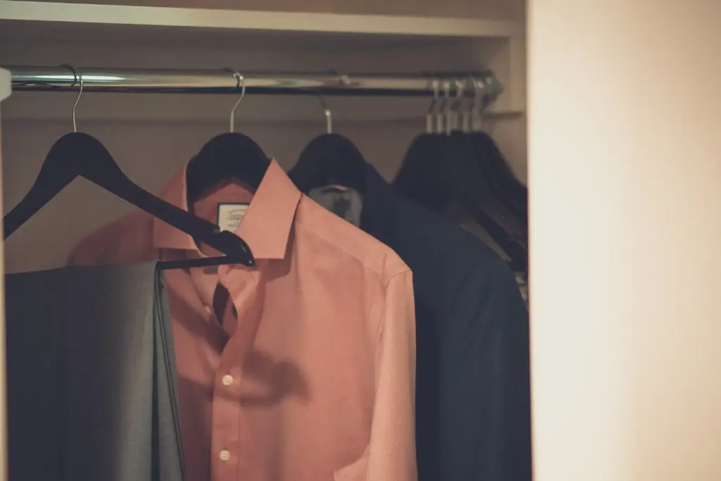 Dress clothes hung in a closet